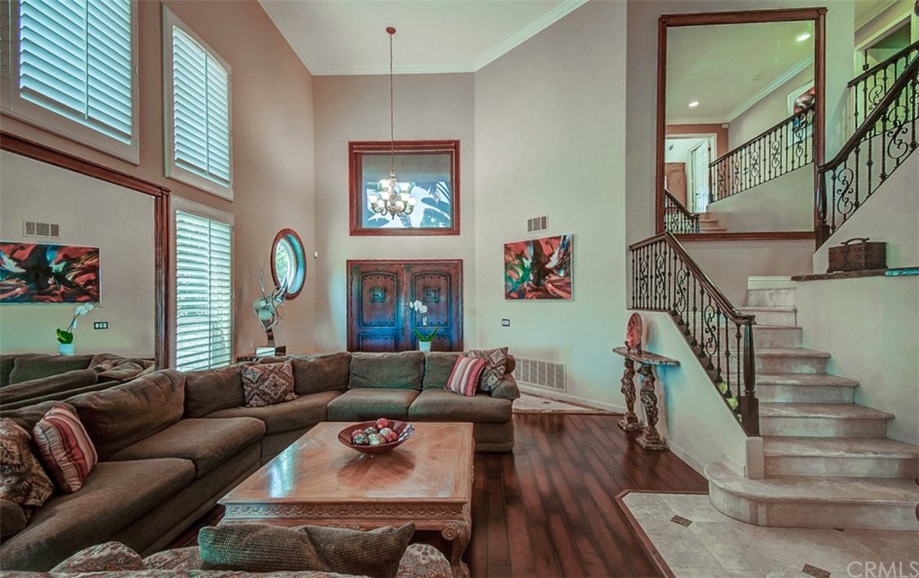 2 High Bluff Laguna Niguel, CA 92677 - Photo 8 of 37 a living room with furniture and a wooden floor