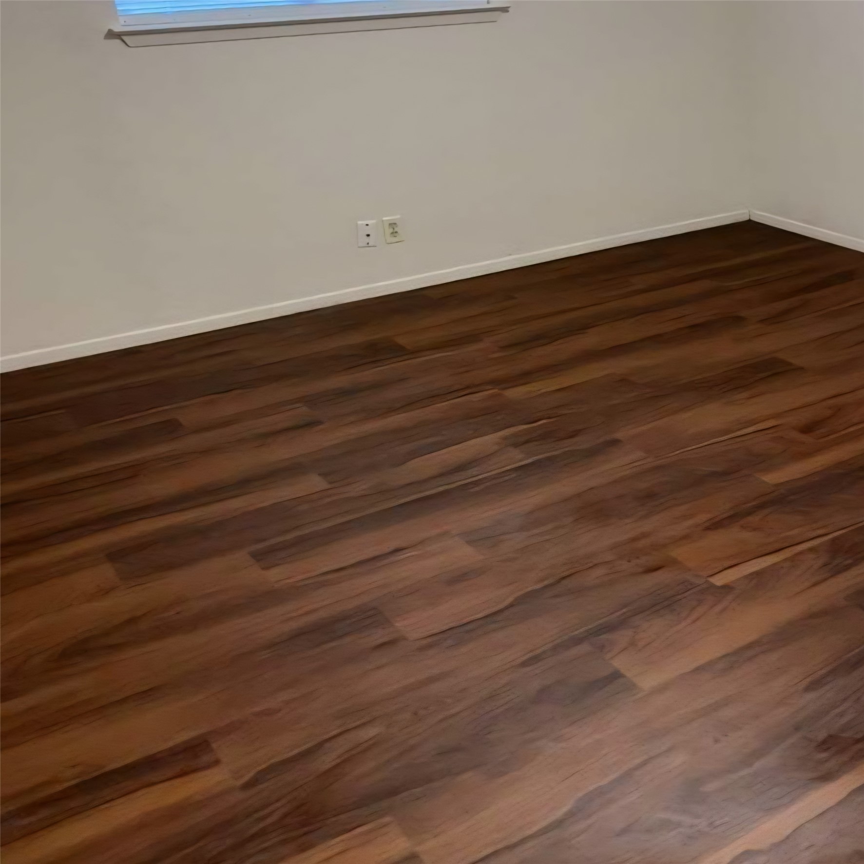 802 Kimberly Street, Unit A Georgetown, TX 78628 - Photo 5 of 7 Unfurnished room with new LVP dark wood floors