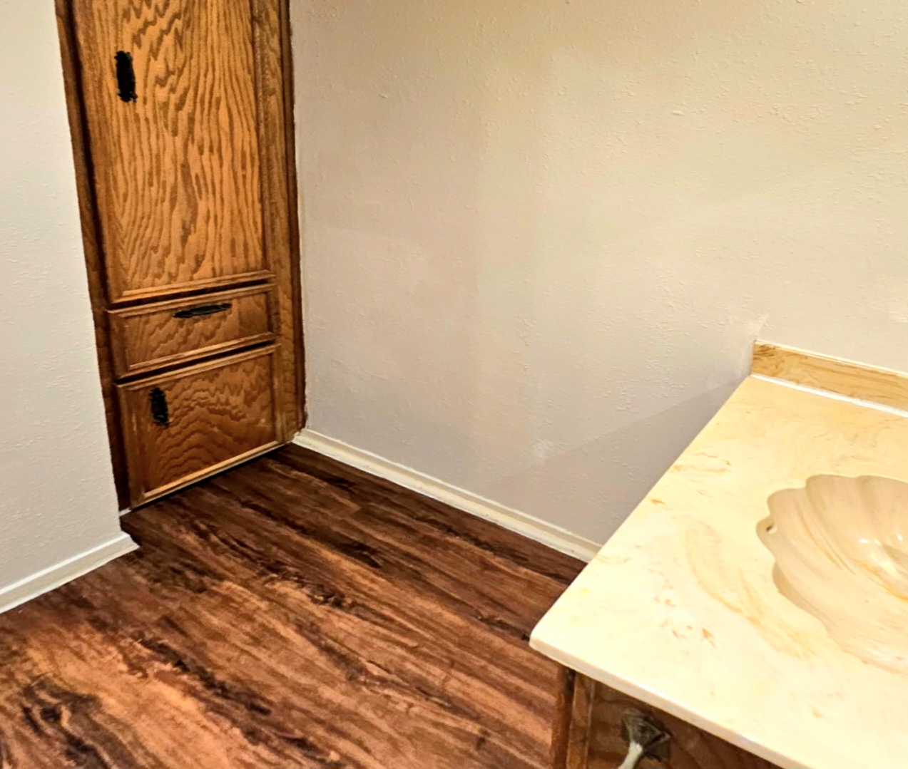 802 Kimberly Street, Unit A Georgetown, TX 78628 - Photo 6 of 7 Primary bath sink & cabinet