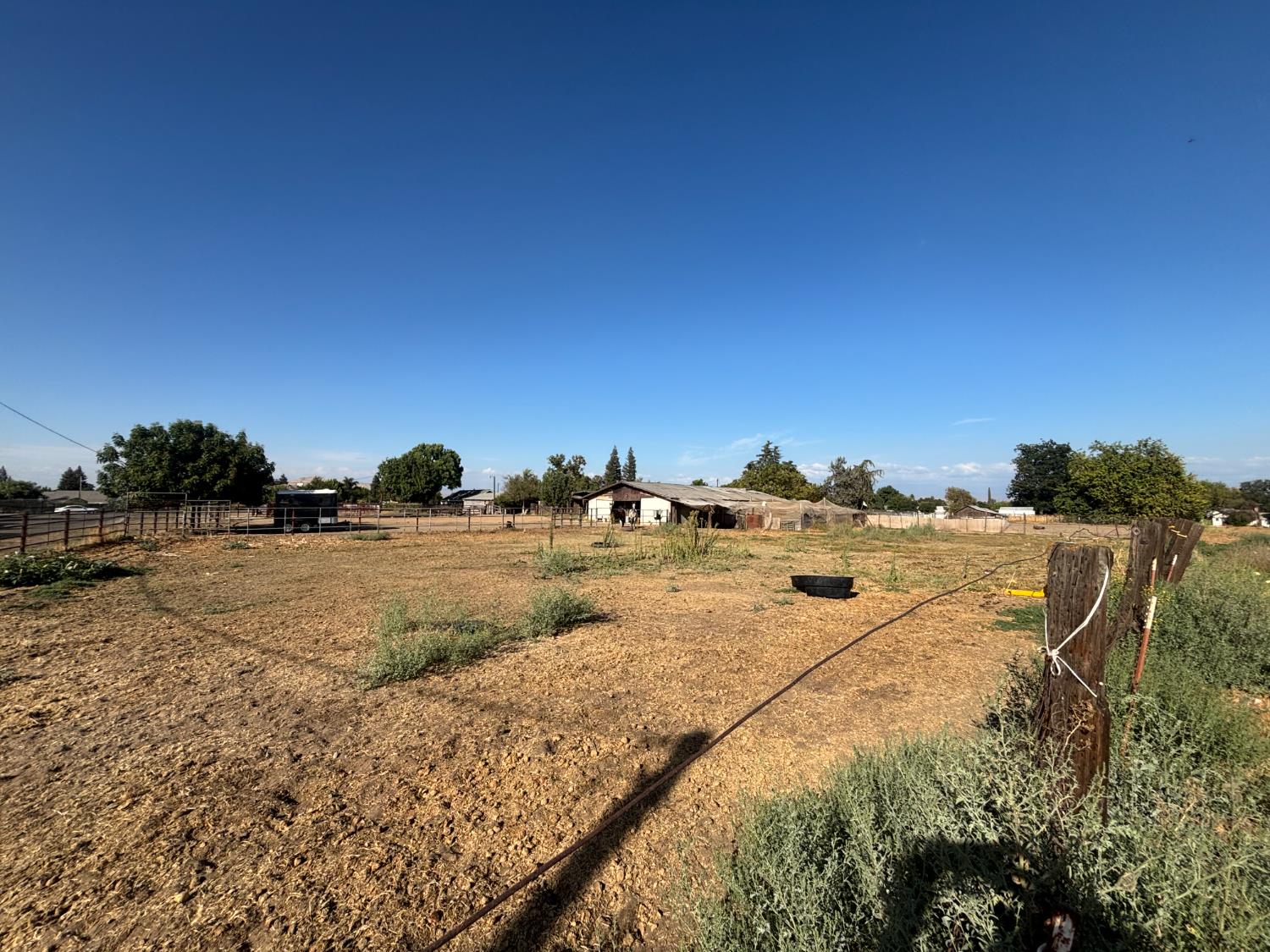19317 East Parlier Avenue Reedley, CA 93654 - Photo 27 of 36 a view of ocean with large tree