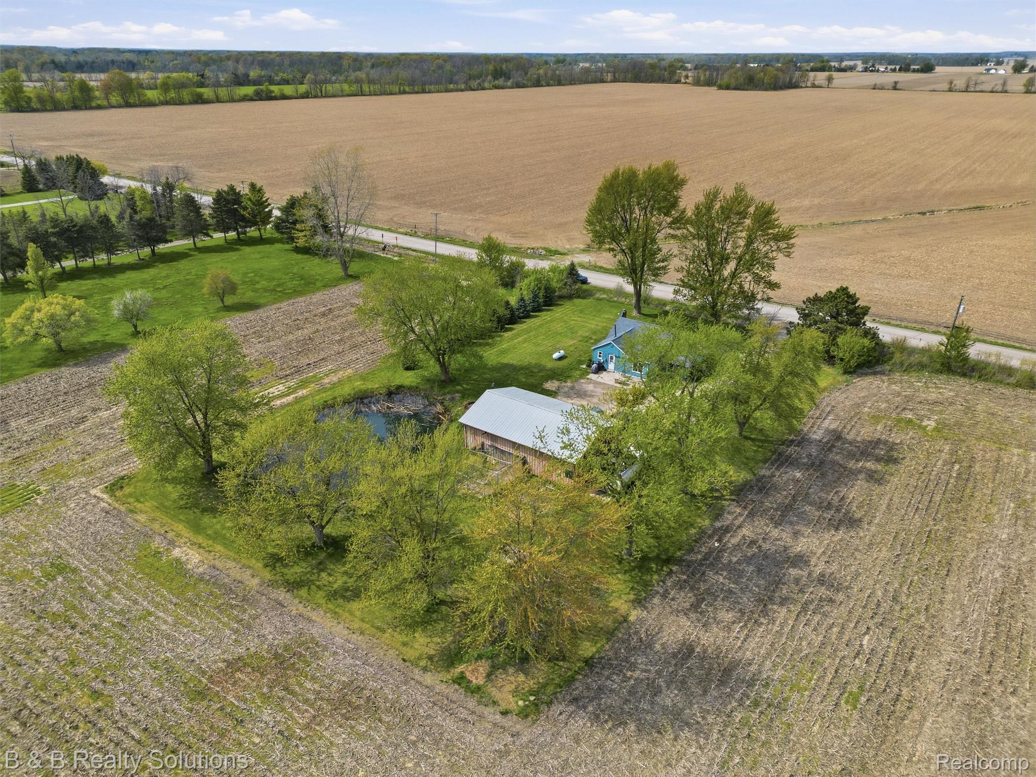 21900 Bordman Road Armada, MI 48005 - Photo 9 of 55 Overview of rural landscape with large plots for crops