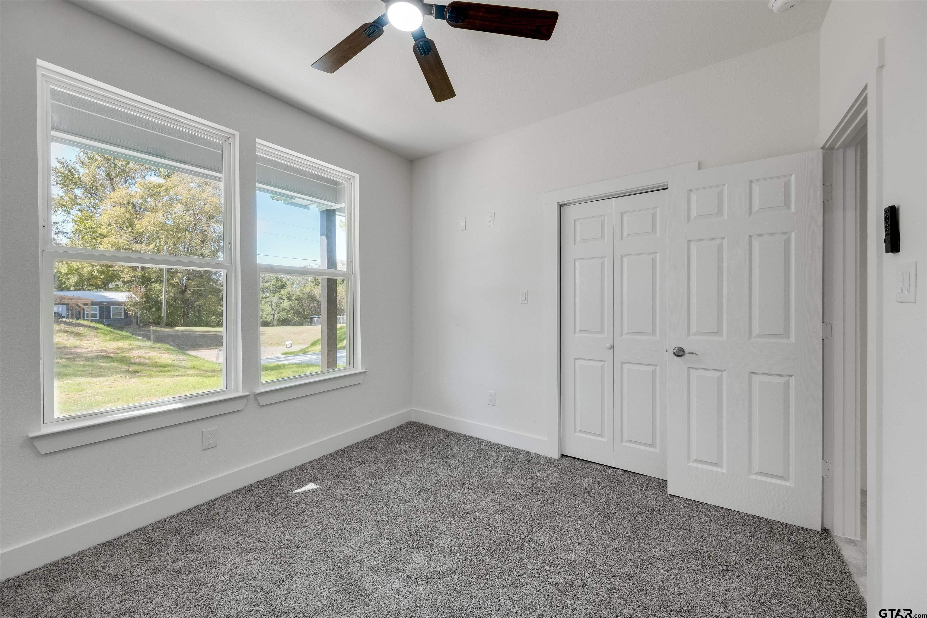 201 Victory Street Palestine, TX 75803 - Photo 15 of 37 a view of an empty room with a window