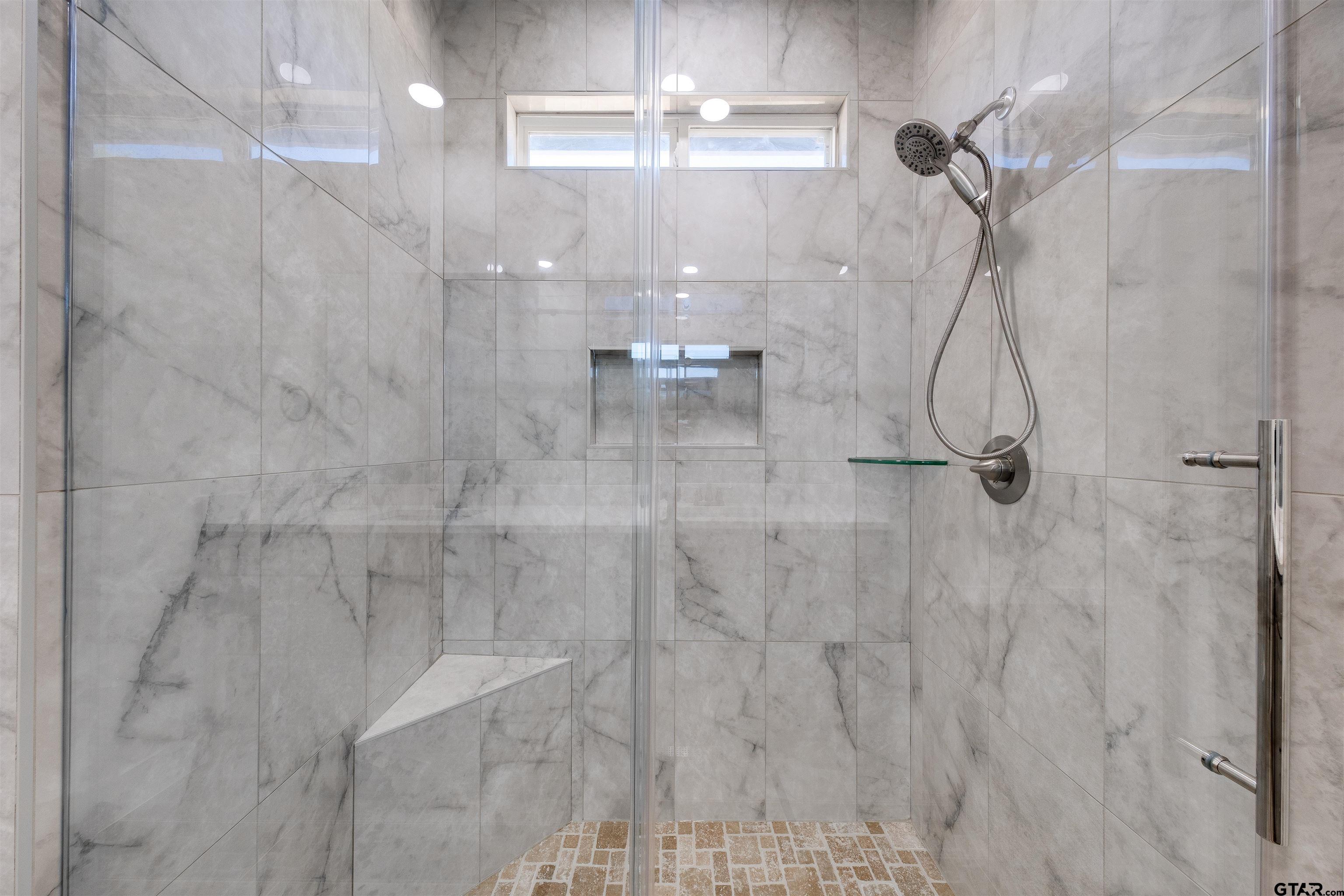 201 Victory Street Palestine, TX 75803 - Photo 18 of 37 a bathroom with a shower