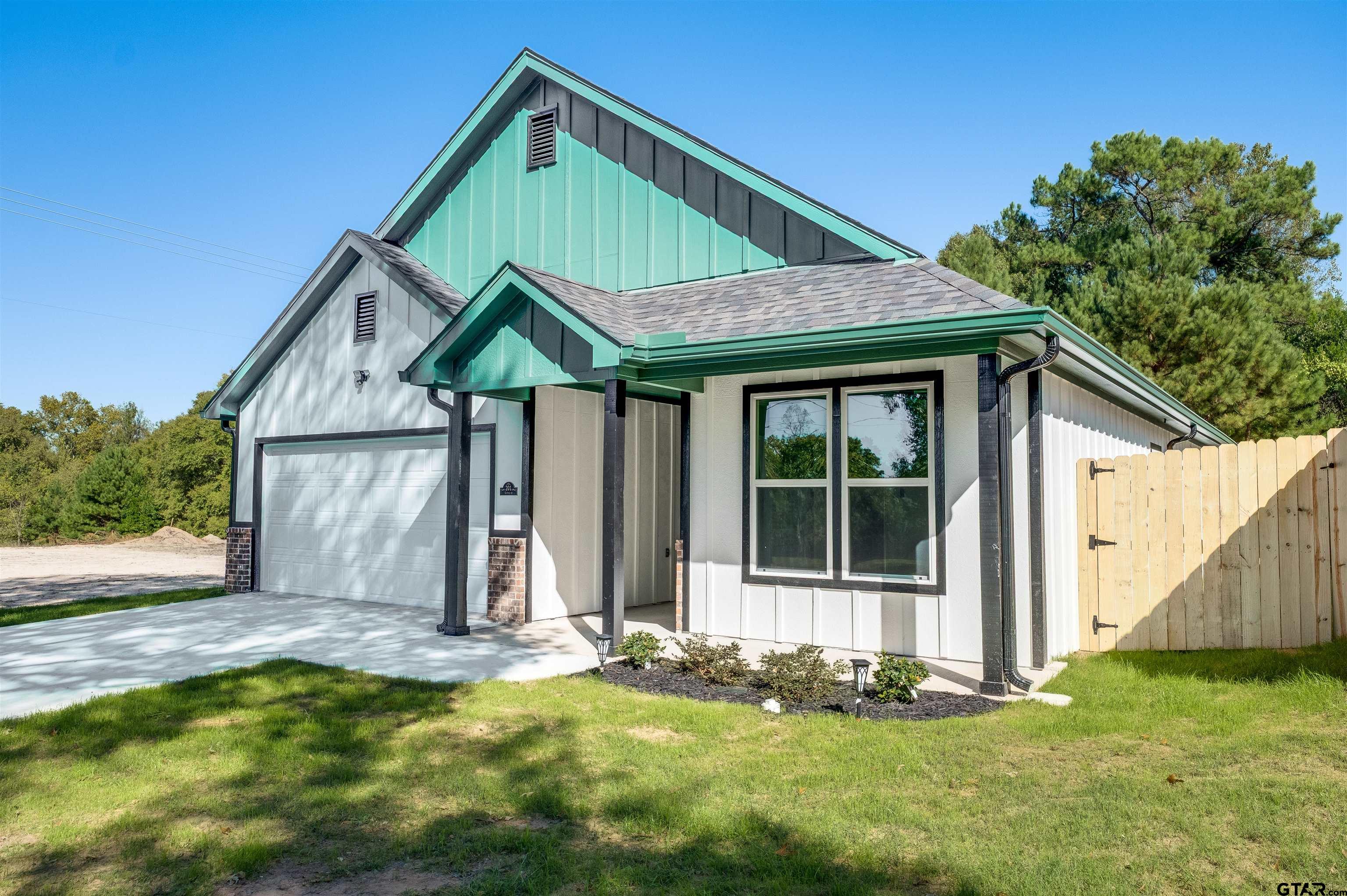 201 Victory Street Palestine, TX 75803 - Photo 2 of 37 a front view of a house with a yard