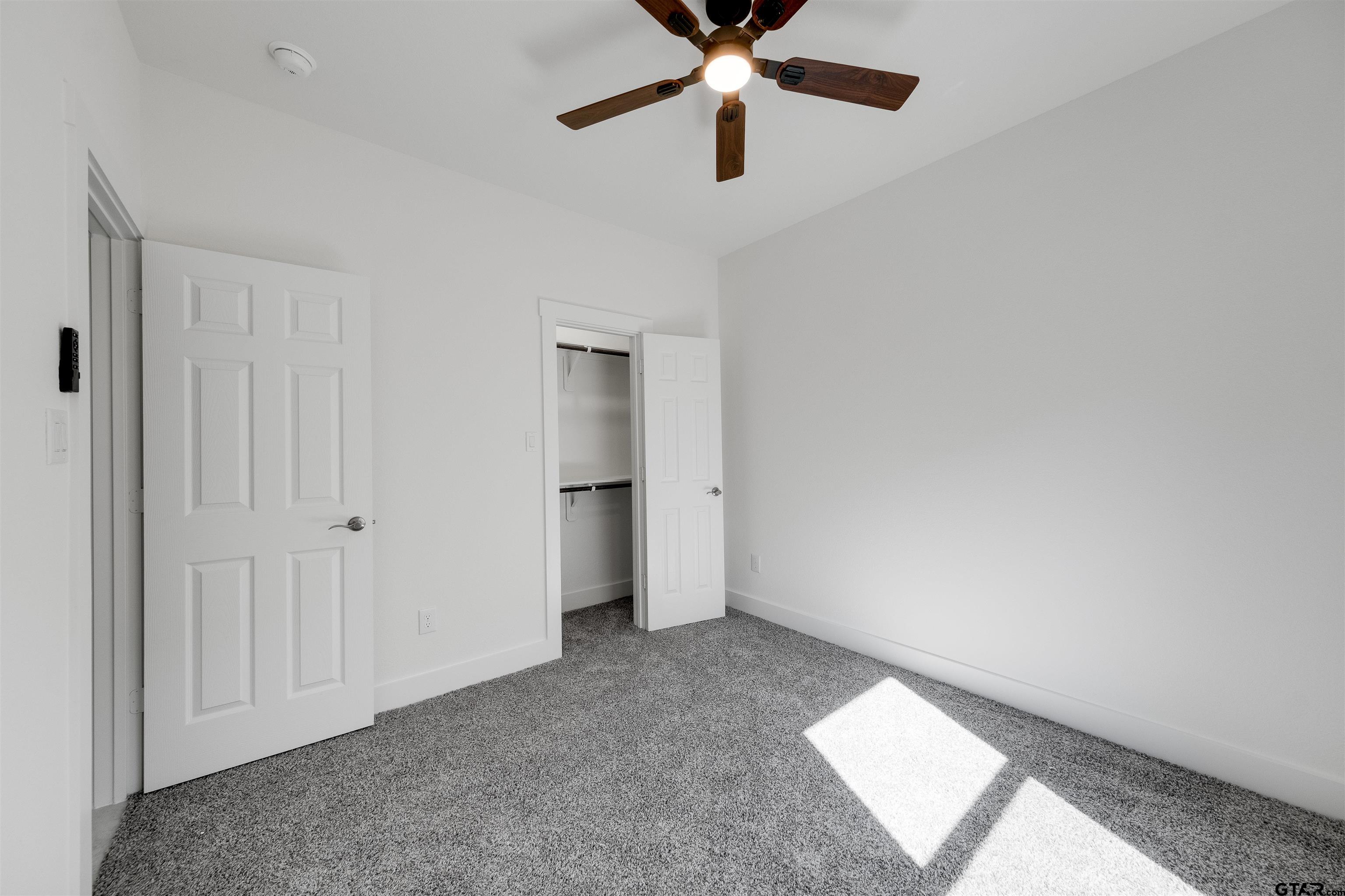 201 Victory Street Palestine, TX 75803 - Photo 26 of 37 wooden floor in an empty room