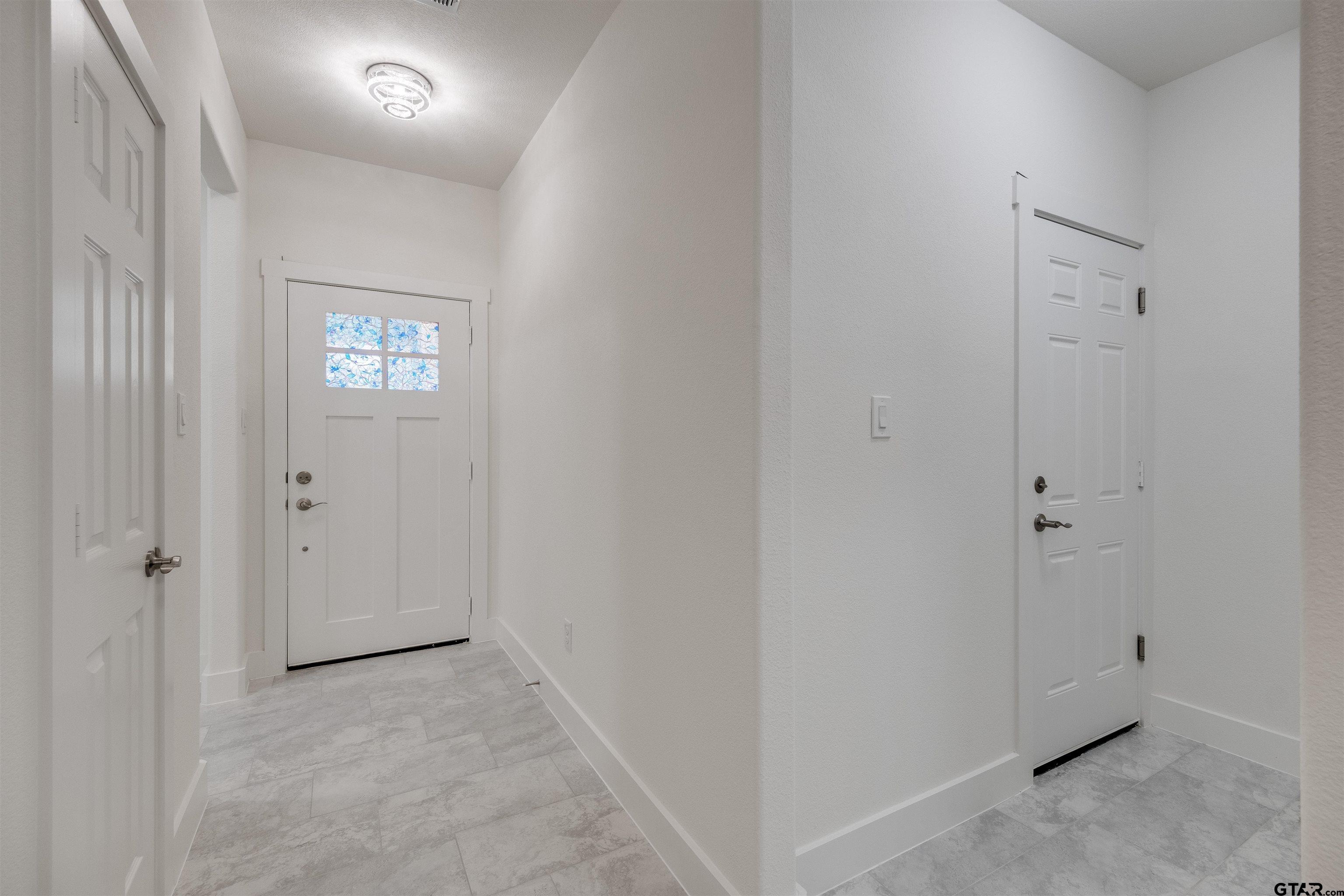 201 Victory Street Palestine, TX 75803 - Photo 5 of 37 an empty room with windows