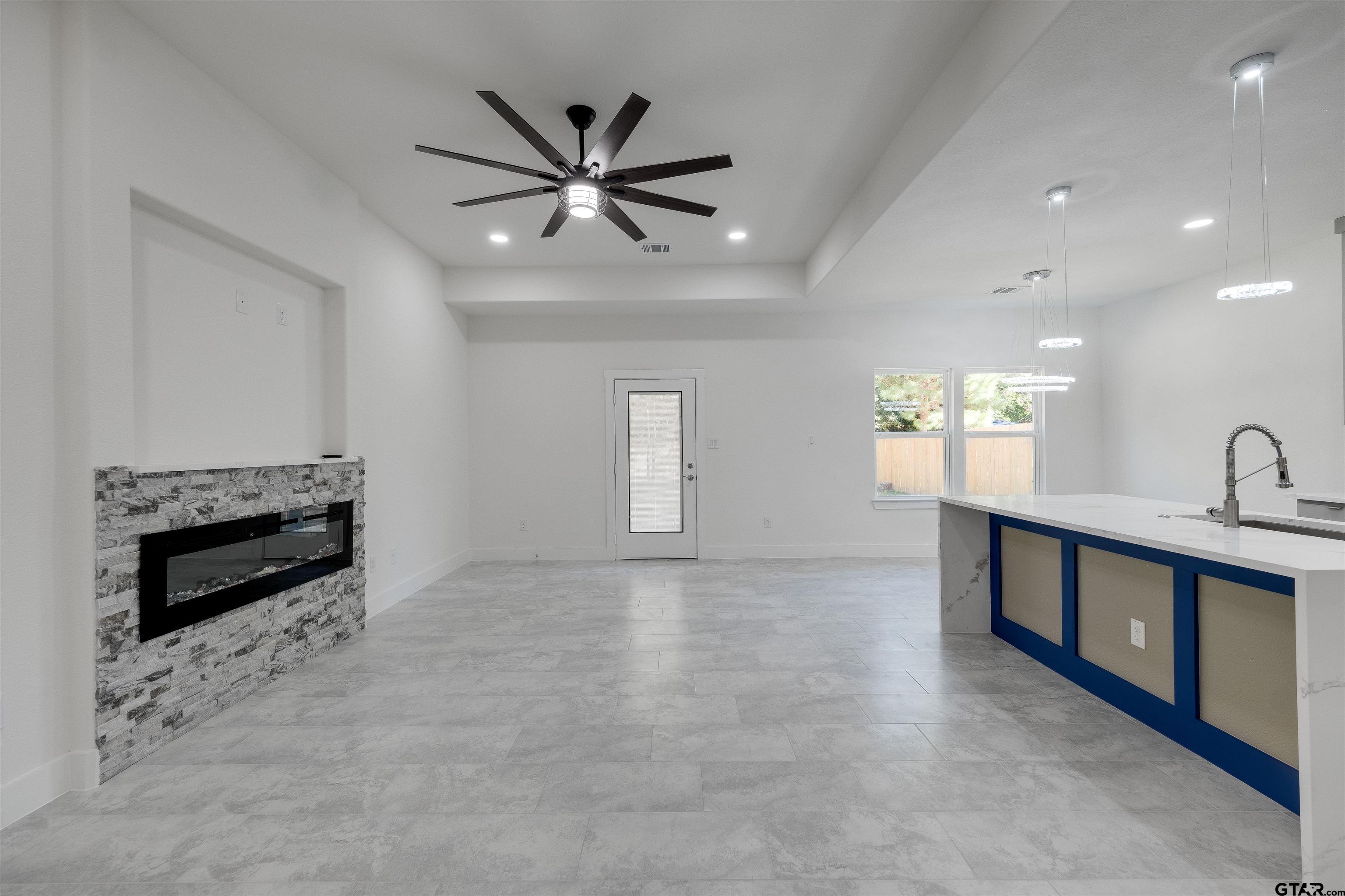 201 Victory Street Palestine, TX 75803 - Photo 9 of 37 a view of a livingroom with a staircase