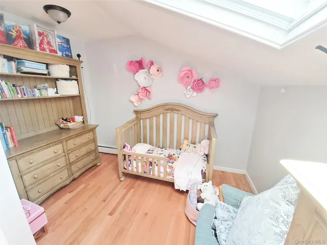a bathroom with a shower and a sink