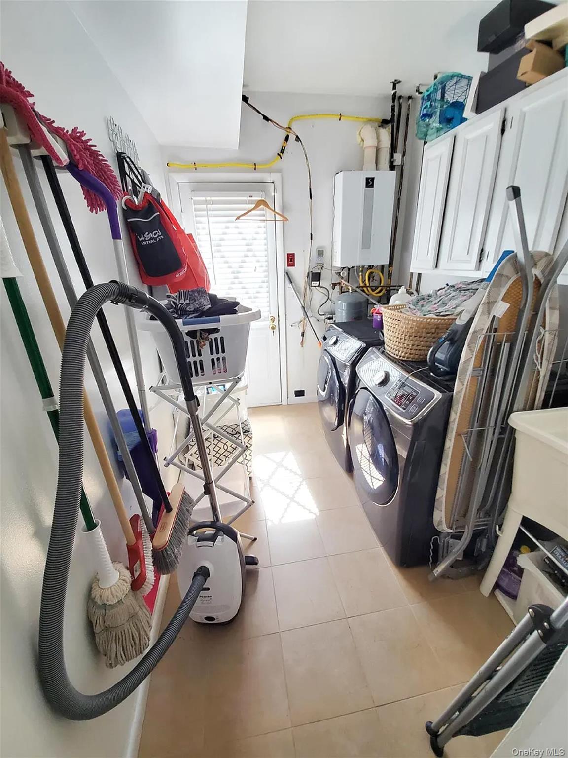 66 Leroy Avenue Valhalla, NY 10595 - Photo 27 of 31 a view of gym equipment and living room