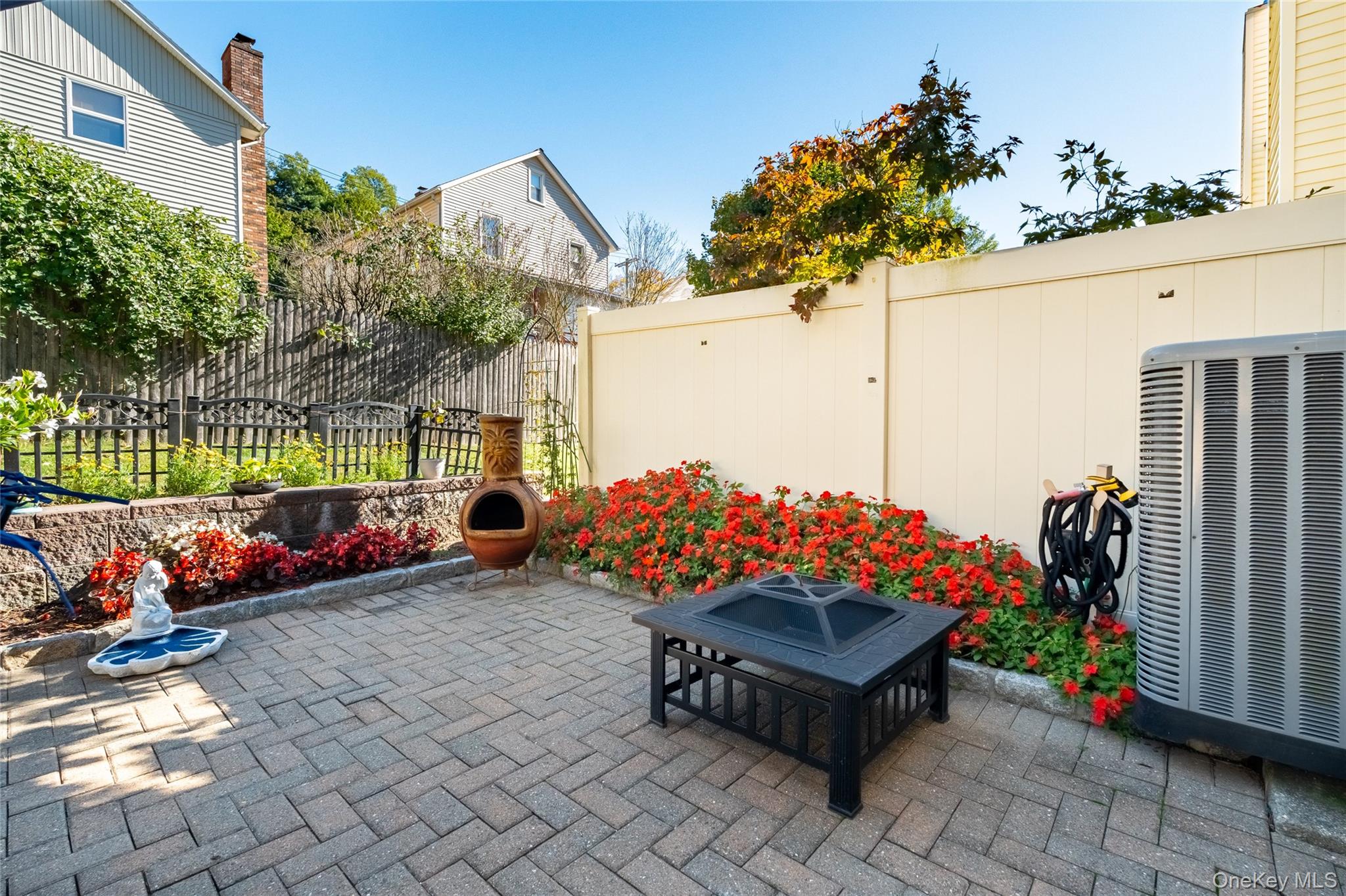 66 Leroy Avenue Valhalla, NY 10595 - Photo 29 of 31 a view of a chairs and table in the patio