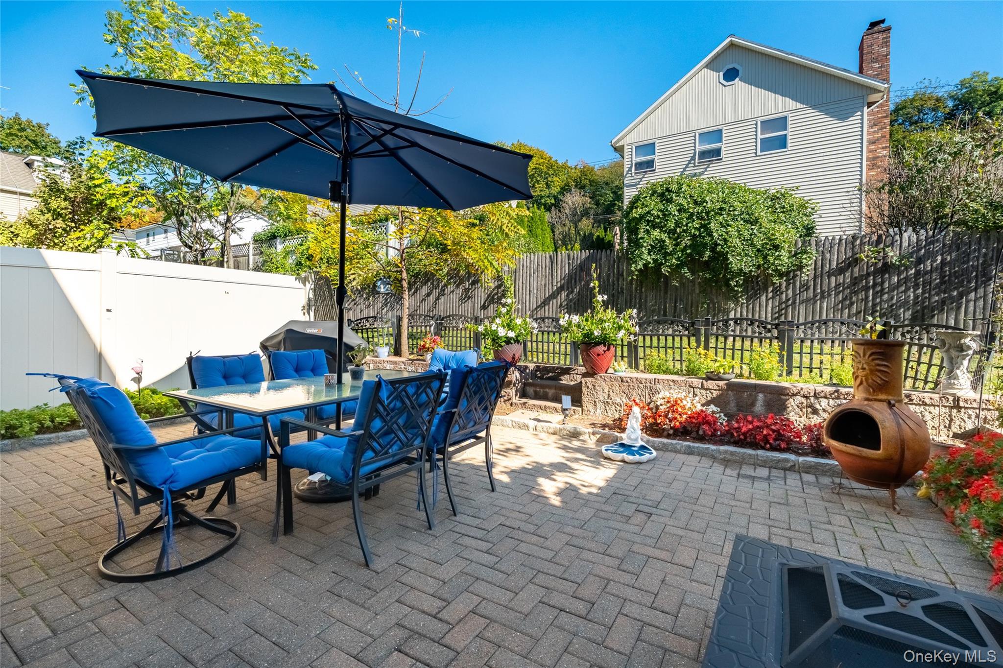 66 Leroy Avenue Valhalla, NY 10595 - Photo 30 of 31 a view of a chairs and table in patio