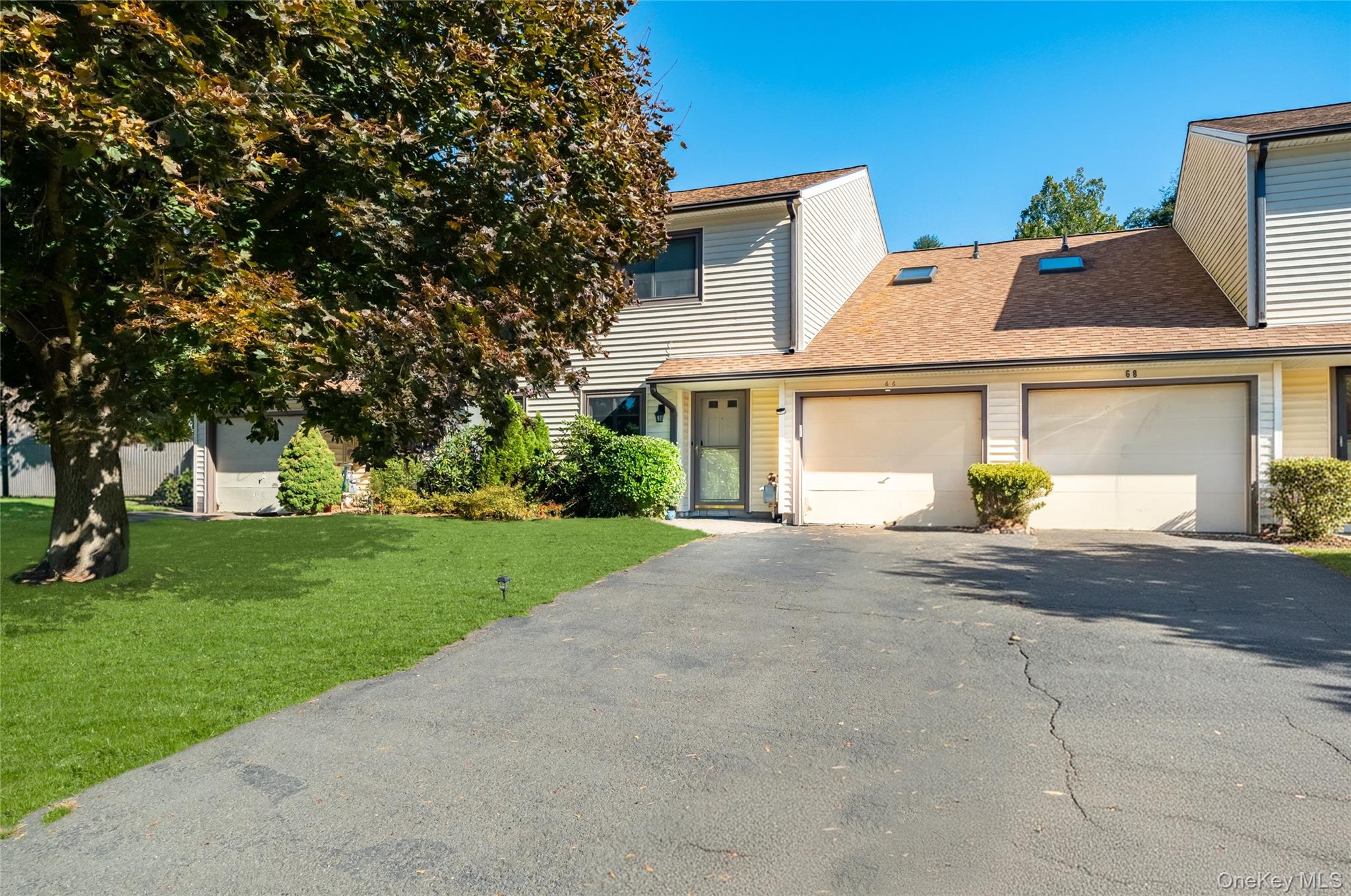66 Leroy Avenue Valhalla, NY 10595 - Photo 3 of 31 front view of a house with a yard