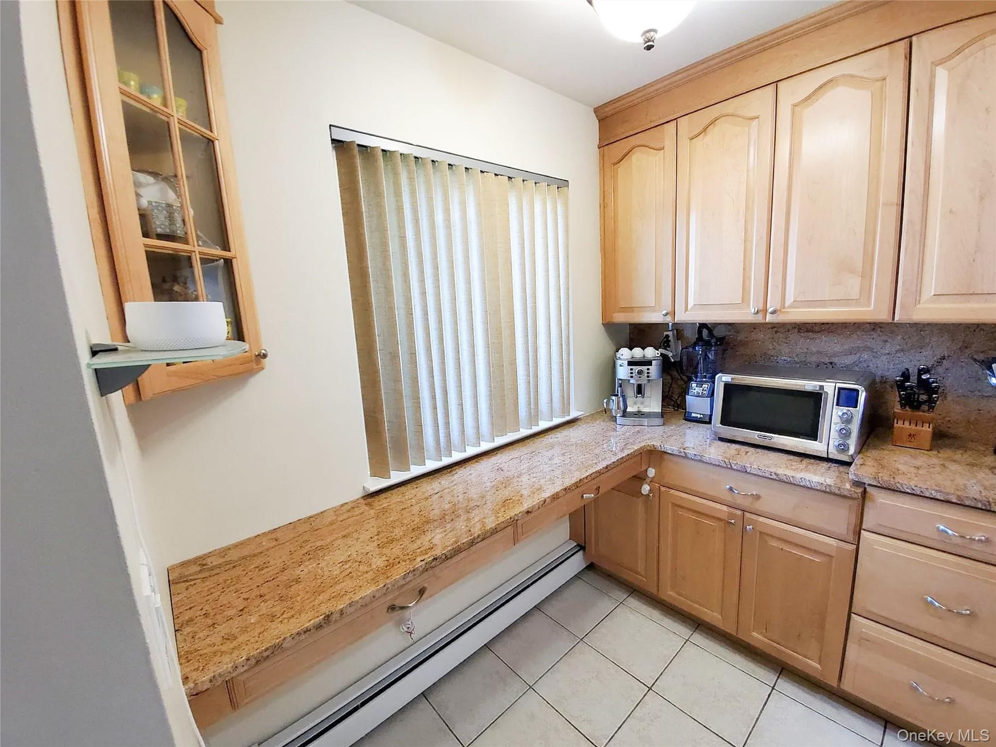 66 Leroy Avenue Valhalla, NY 10595 - Photo 4 of 31 a kitchen with a sink and cabinets