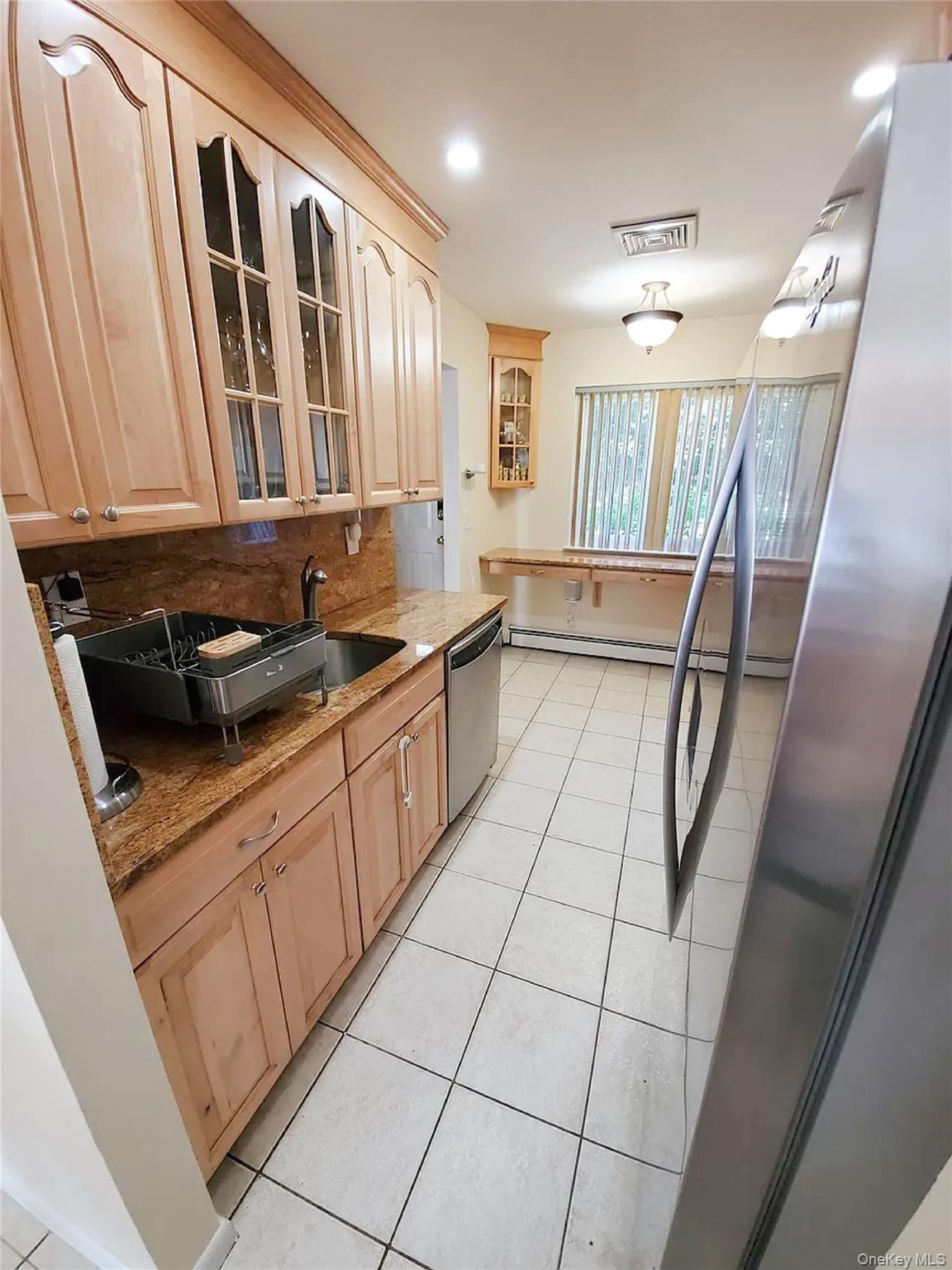 66 Leroy Avenue Valhalla, NY 10595 - Photo 9 of 31 a kitchen with a sink and cabinets