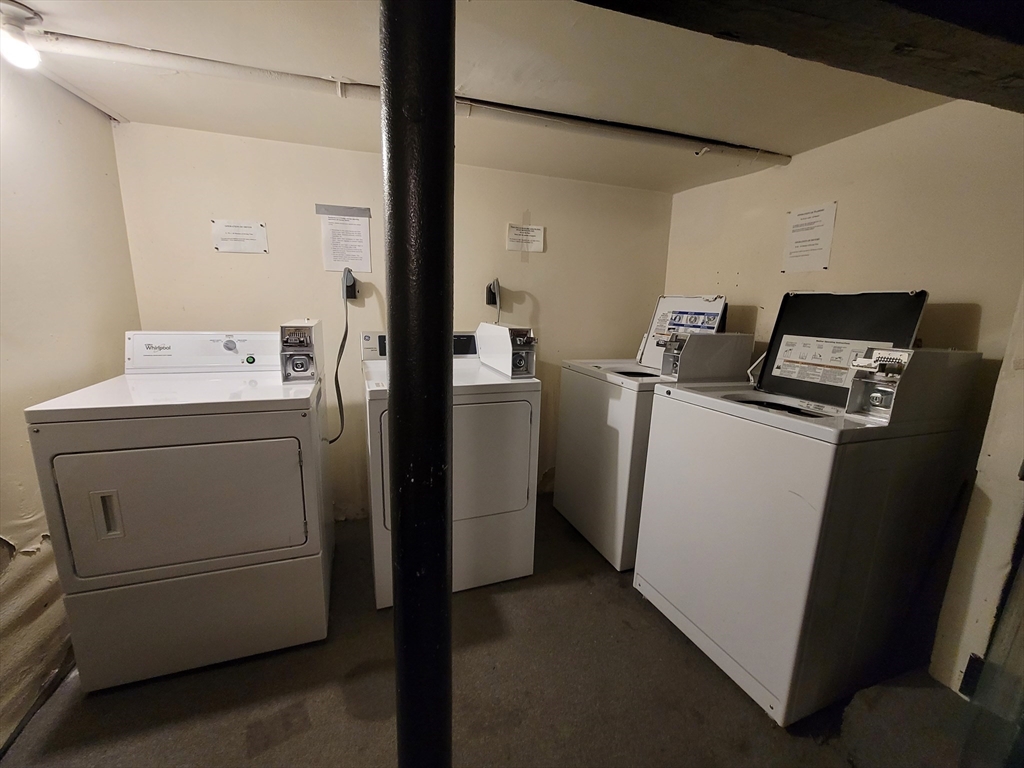 11 Phillips Street, Unit 8 Boston, MA 02114 - Photo 12 of 14 a utility room with dryer and washer