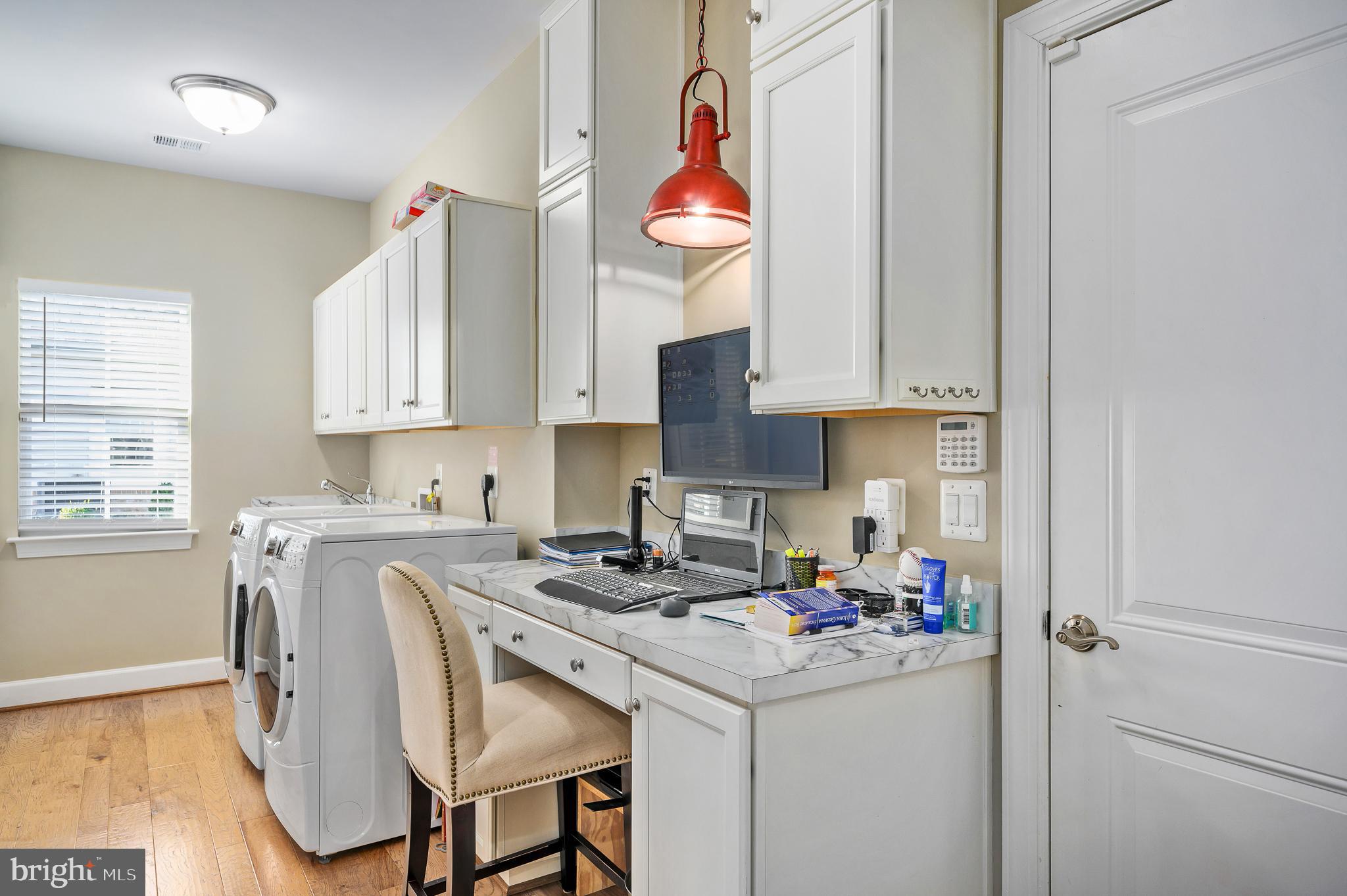 42867 Beaver Crossing Square Ashburn, VA 20148 - Photo 17 of 33 Laundry room and convenient desk area