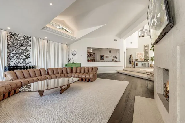 a kitchen with stainless steel appliances kitchen island granite countertop a sink and cabinets