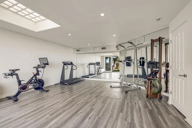 a view of a livingroom with furniture and windows