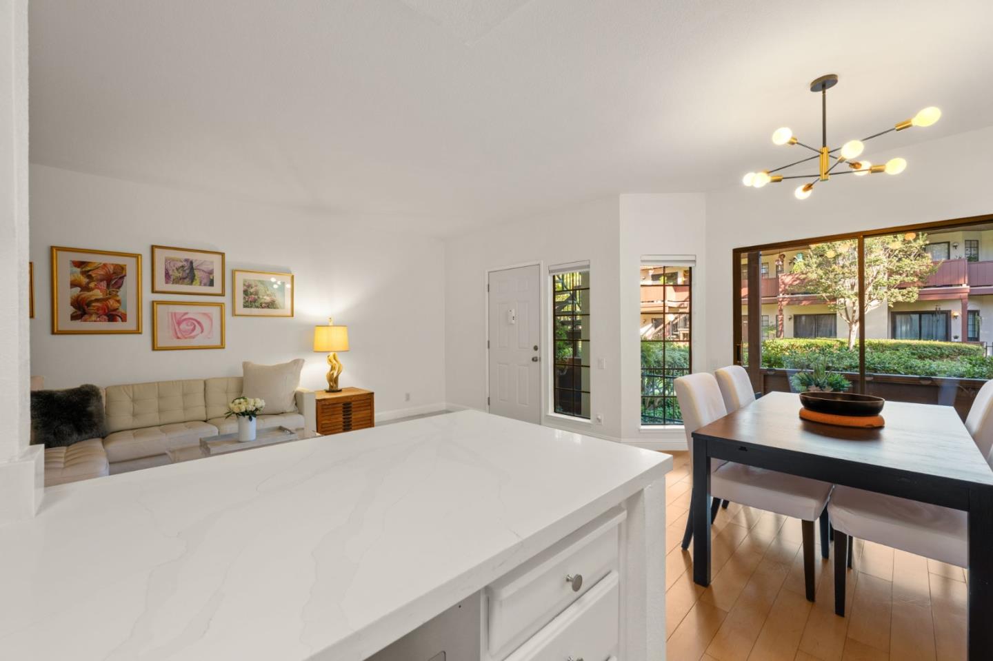 473 Costa Mesa Terrace, Unit C Sunnyvale, CA 94085 - Photo 15 of 40 a view of a dining room with furniture window and outside view