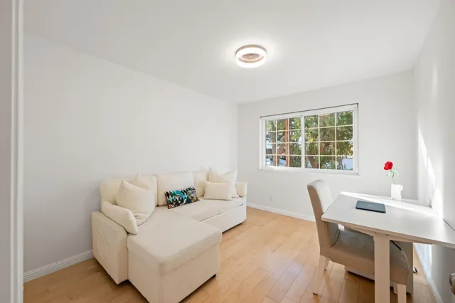 a living room with furniture and window
