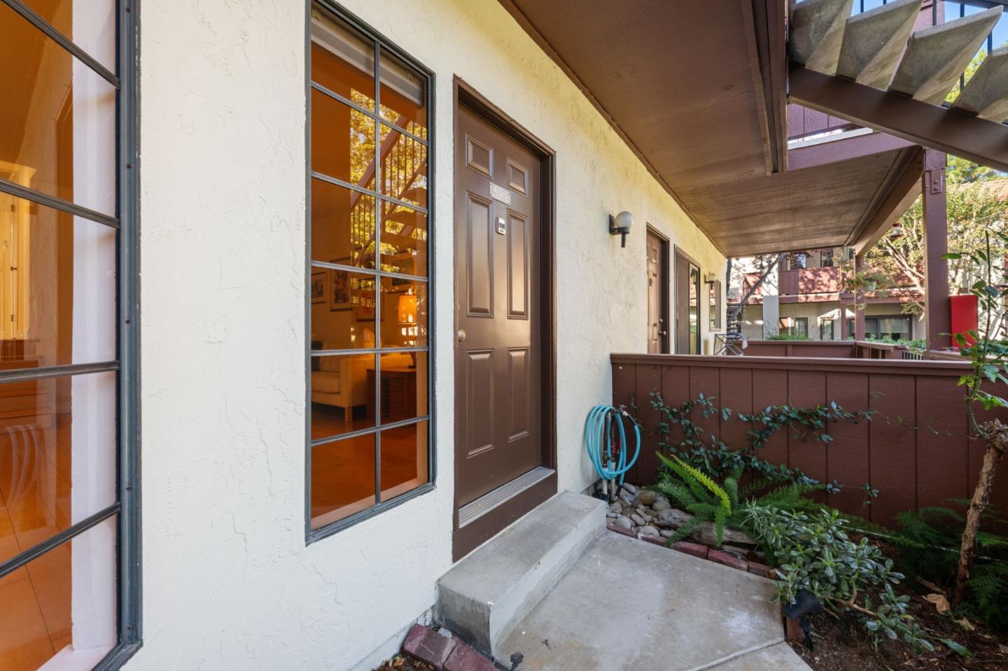 473 Costa Mesa Terrace, Unit C Sunnyvale, CA 94085 - Photo 31 of 40 a front view of a house