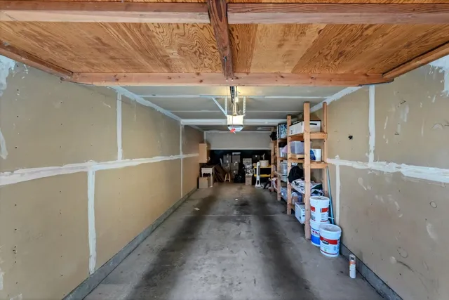 a view of a room with lots of gym equipment