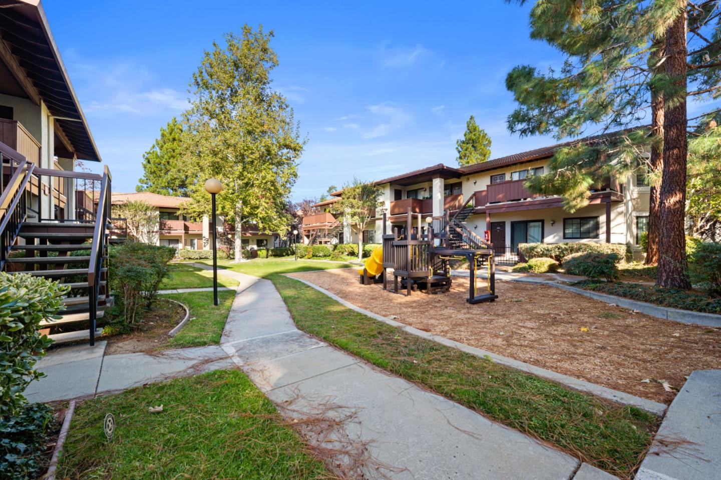 473 Costa Mesa Terrace, Unit C Sunnyvale, CA 94085 - Photo 36 of 40 a view of a park with swings and slides