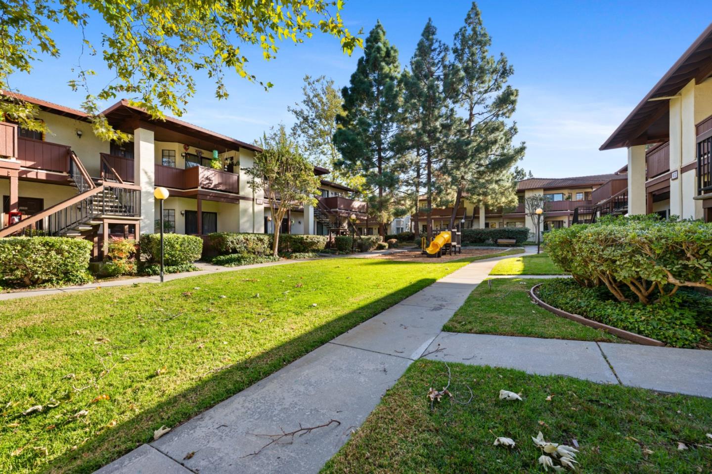 473 Costa Mesa Terrace, Unit C Sunnyvale, CA 94085 - Photo 37 of 40 a view of yard with swimming pool and green space