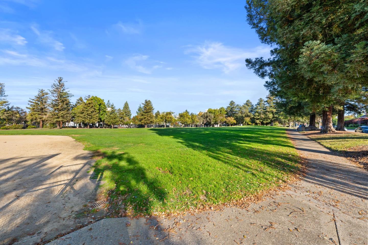 473 Costa Mesa Terrace, Unit C Sunnyvale, CA 94085 - Photo 39 of 40 a view of a golf course with a lake