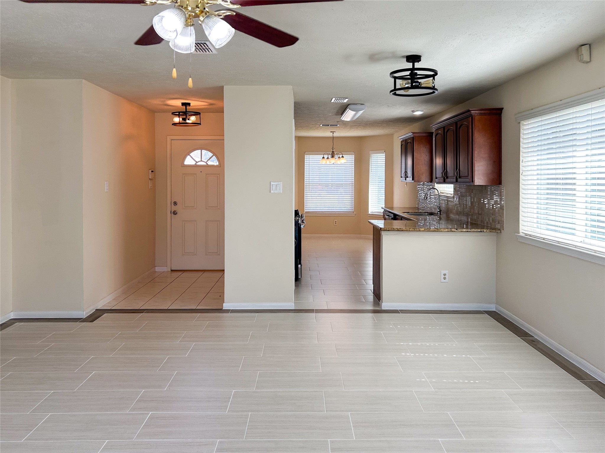 29219 Waltham Street Spring, TX 77386 - Photo 12 of 23 an empty room with fan and windows