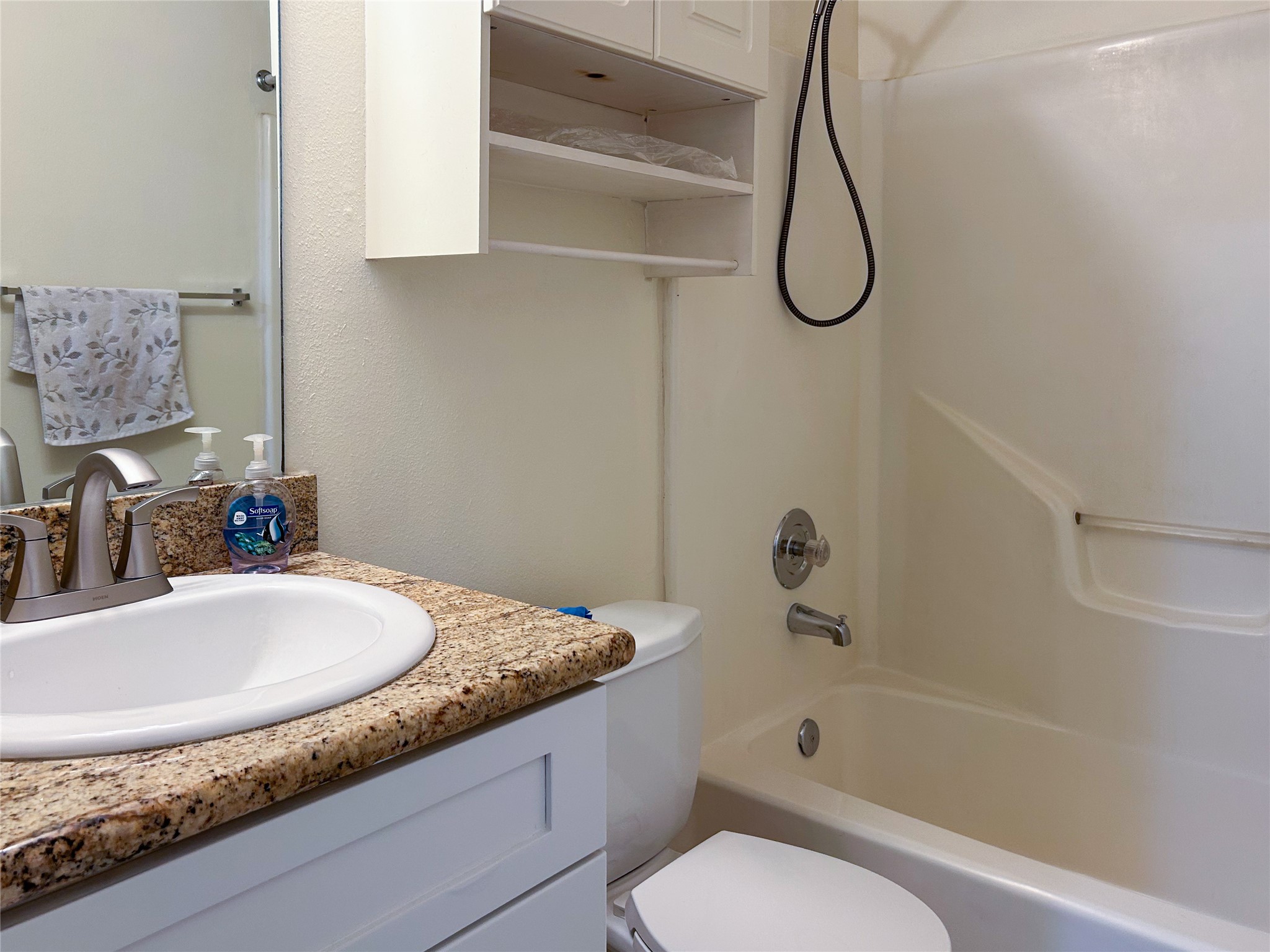 29219 Waltham Street Spring, TX 77386 - Photo 20 of 23 a bathroom with a granite countertop sink a toilet and bathtub