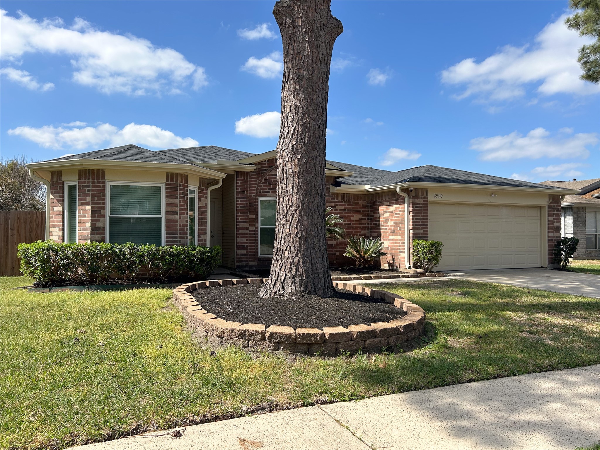29219 Waltham Street Spring, TX 77386 - Photo 22 of 23 a front view of a house with a yard