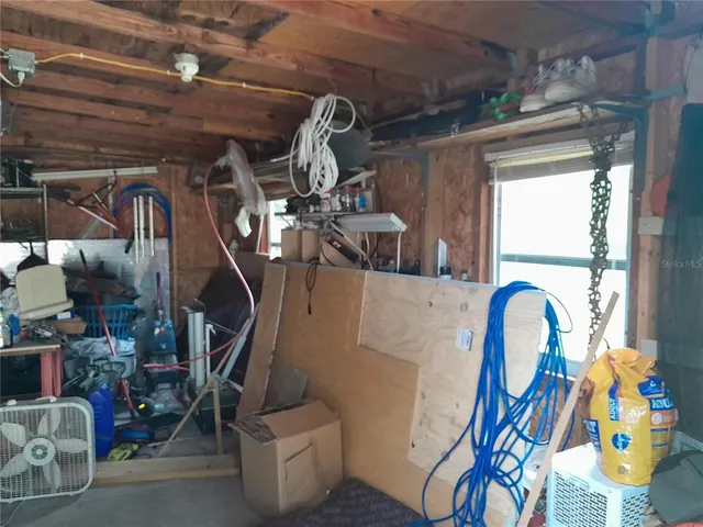 storage and utility room with washer and dryer