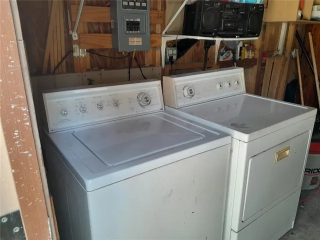 a kitchen with stainless steel appliances a stove and a refrigerator