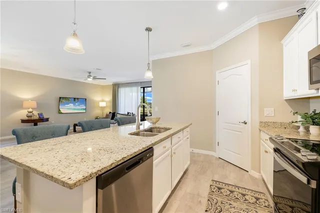 a kitchen with a stove and a sink