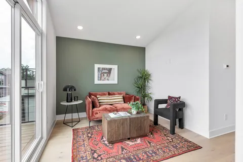 a bedroom with bed and window