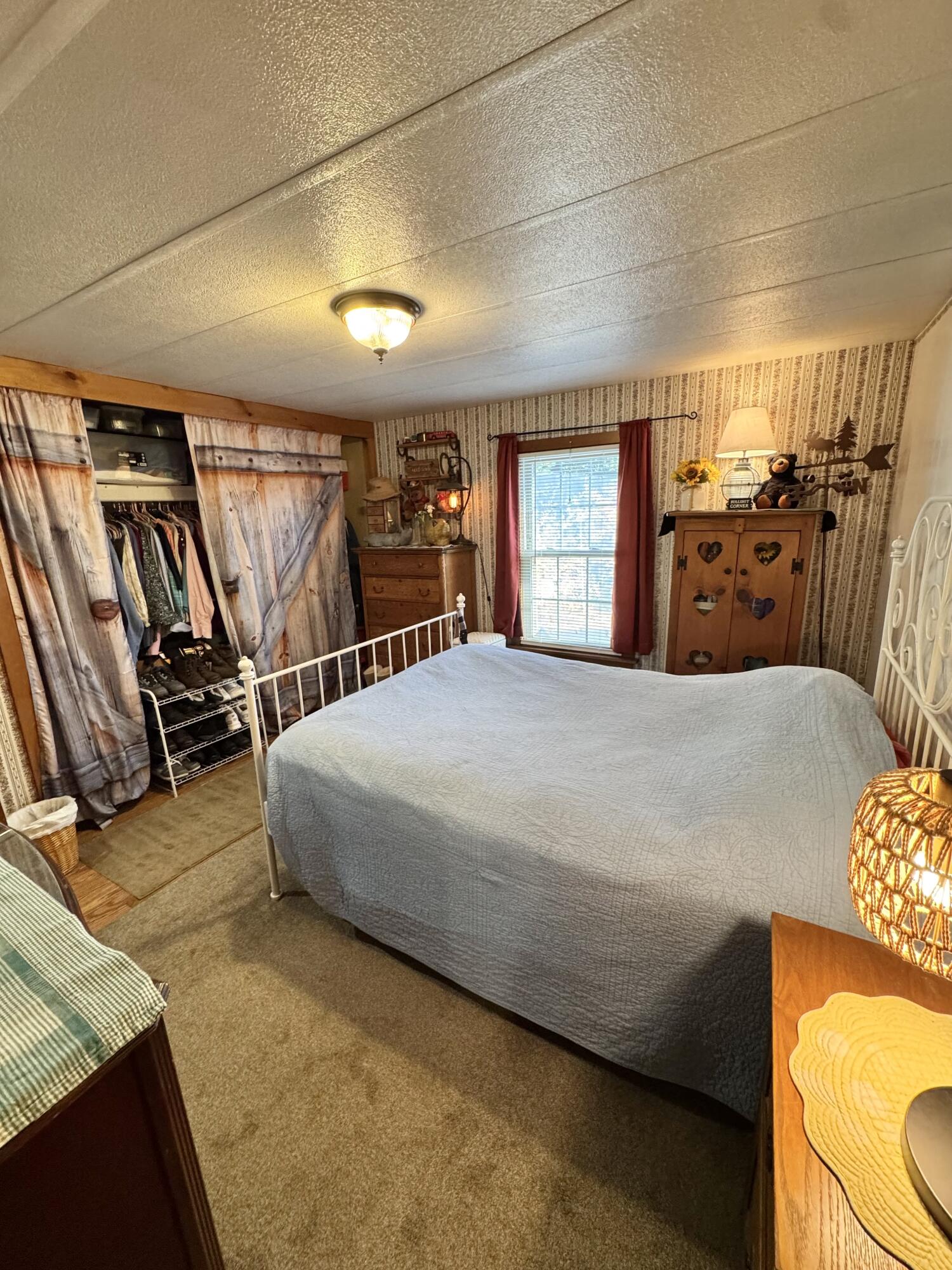189 Pine View Terrace West Wareham, MA 02571 - Photo 16 of 22 a bed sitting in a room next to a window