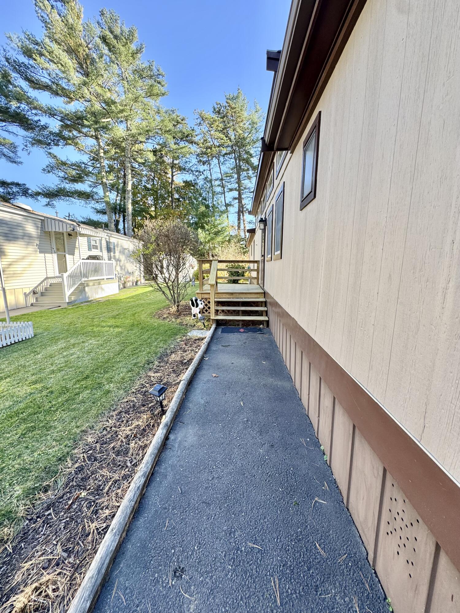 189 Pine View Terrace West Wareham, MA 02571 - Photo 3 of 22 a view of a pathway of a house with a yard