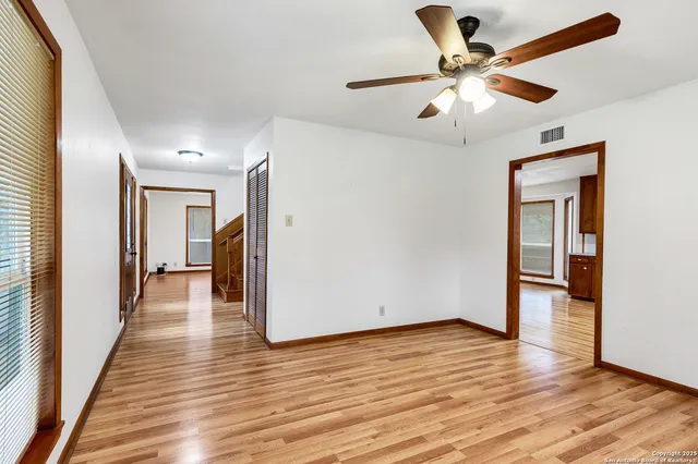 a view of a livingroom with wooden floor