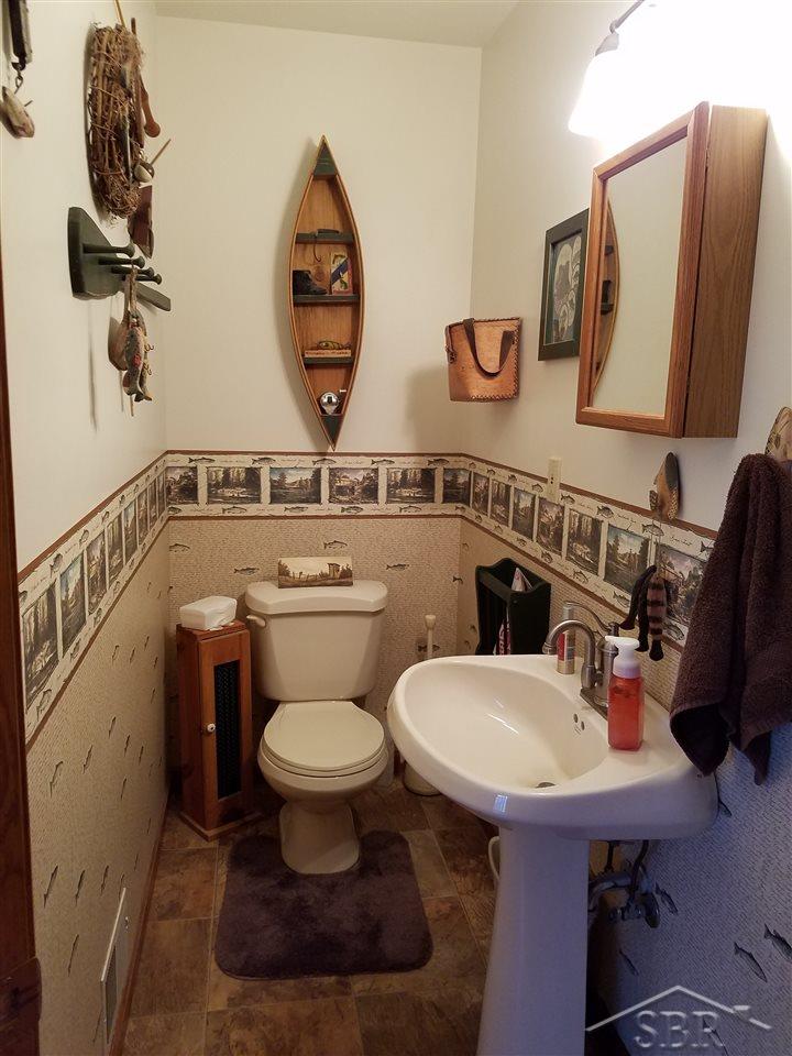 4580 West Gary Road Chesaning, MI 48616 - Photo 25 of 32 Half Bath /Deck entrance
