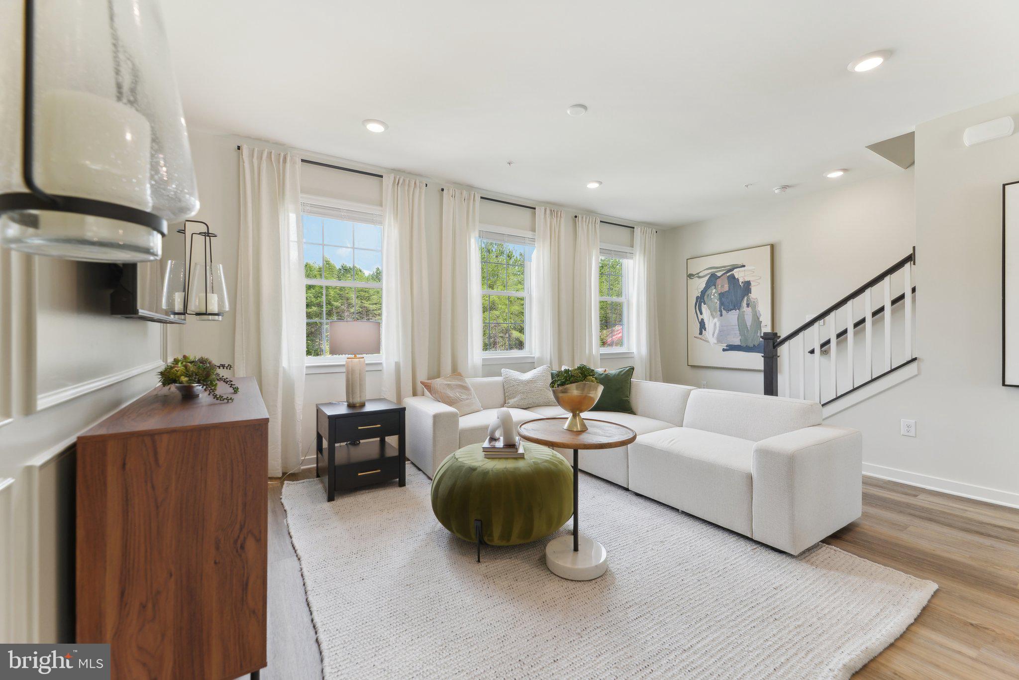 466 Still Feather Avenue La Plata, MD 20646 - Photo 17 of 89 a living room with furniture and a flat screen tv