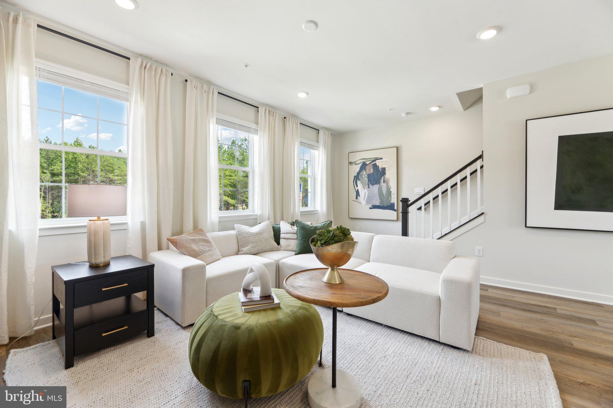466 Still Feather Avenue La Plata, MD 20646 - Photo 18 of 89 a living room with furniture and a large window