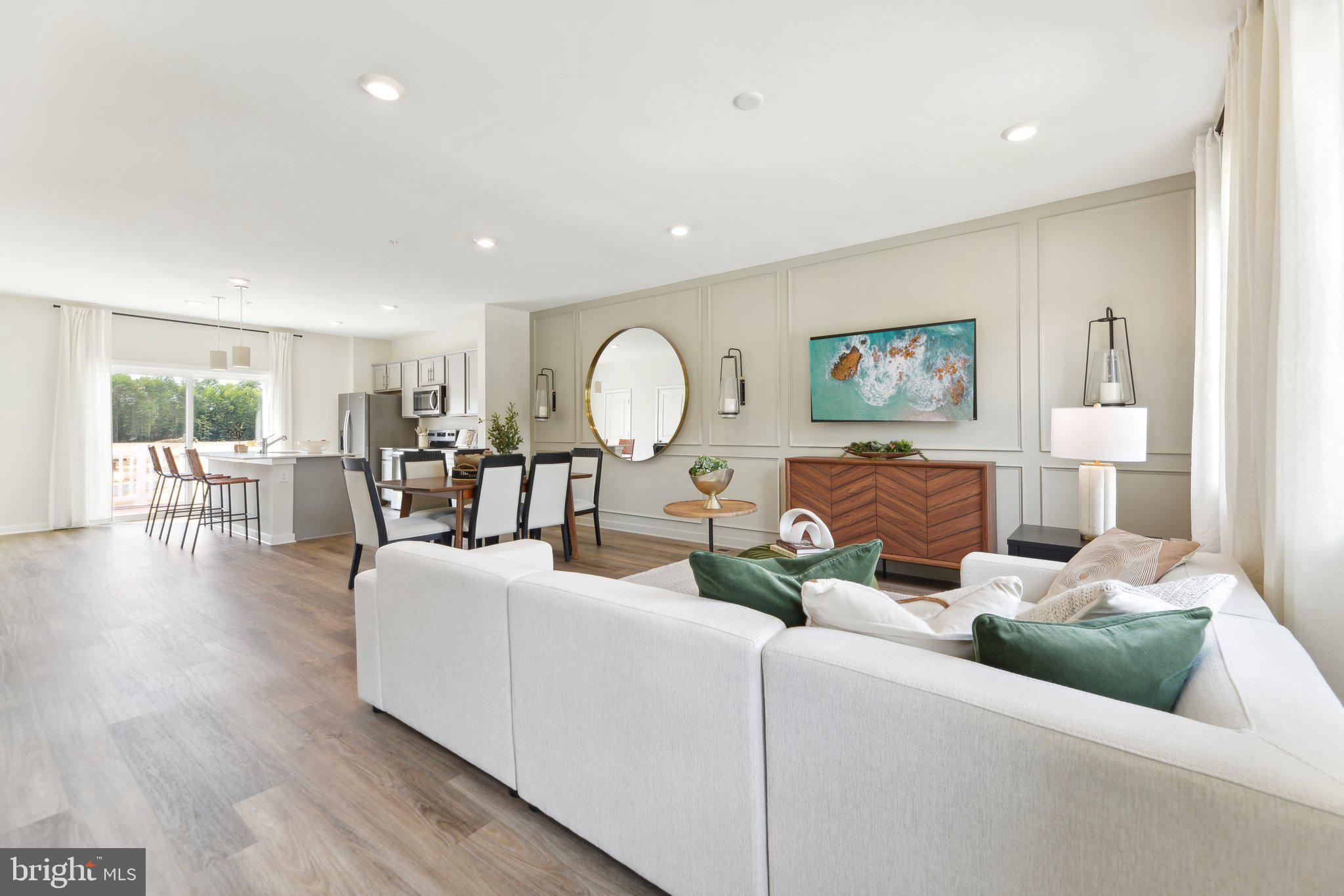 466 Still Feather Avenue La Plata, MD 20646 - Photo 19 of 89 a living room with furniture and wooden floor
