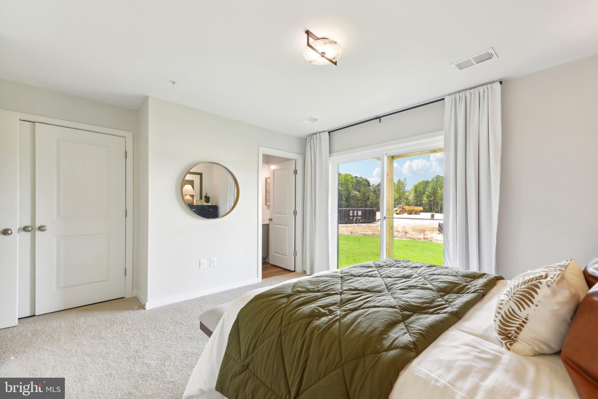 466 Still Feather Avenue La Plata, MD 20646 - Photo 30 of 89 a bedroom with a bed and a window