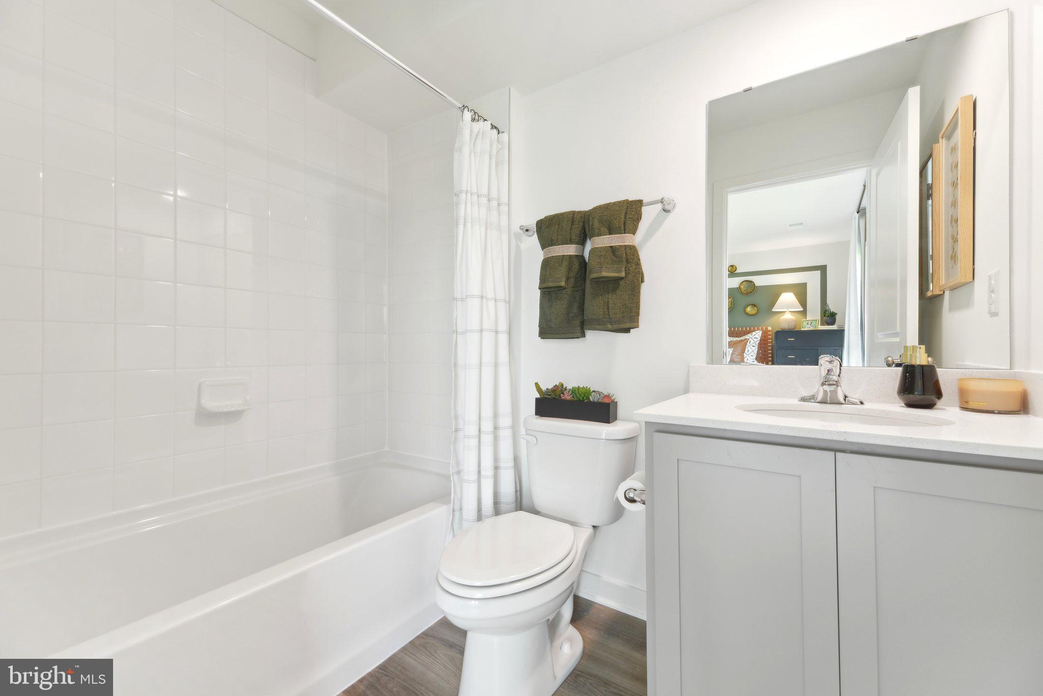 466 Still Feather Avenue La Plata, MD 20646 - Photo 31 of 89 a bathroom with a sink a toilet and shower