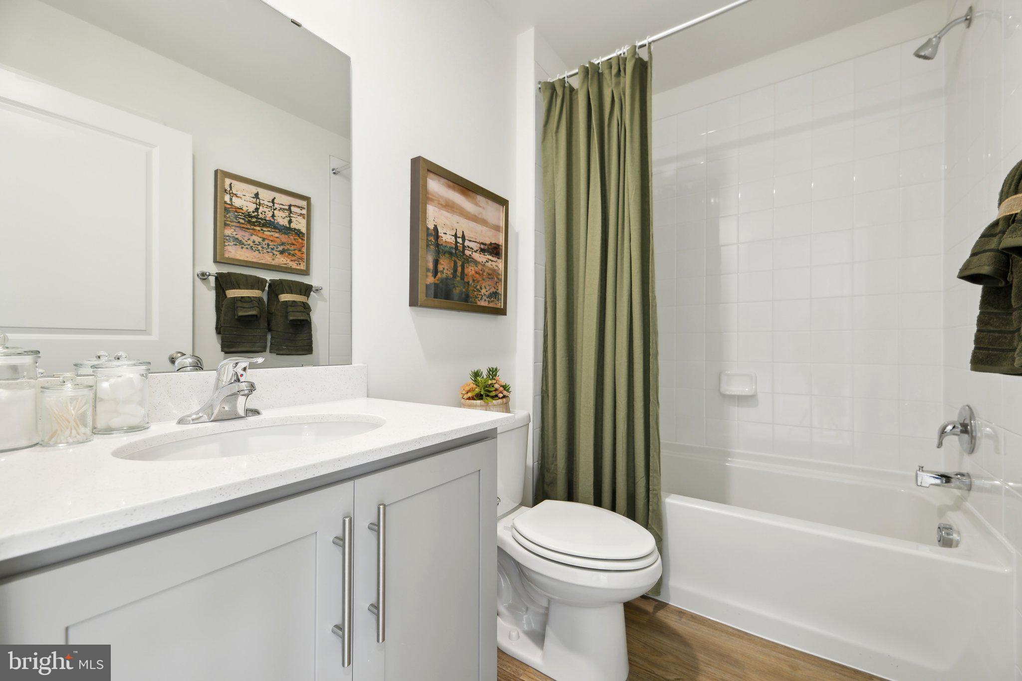 466 Still Feather Avenue La Plata, MD 20646 - Photo 35 of 89 a bathroom with a sink a toilet and shower