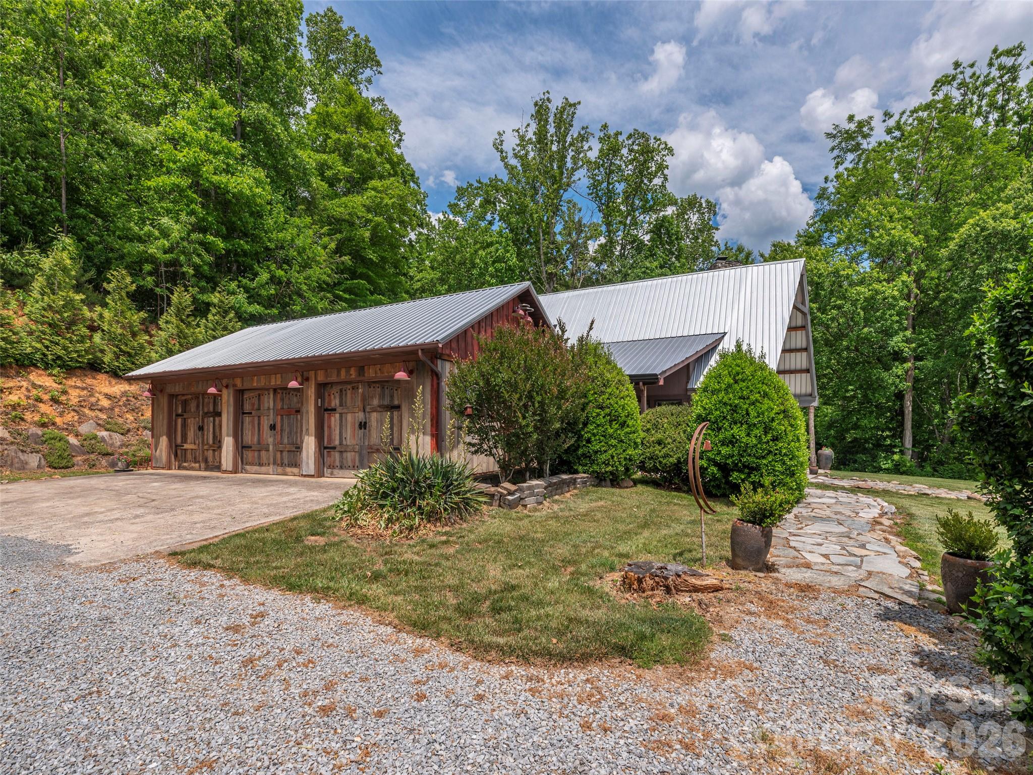 461 Ferguson Cove Loop Clyde, NC 28721 - Photo 39 of 46 front view of a house with a yard