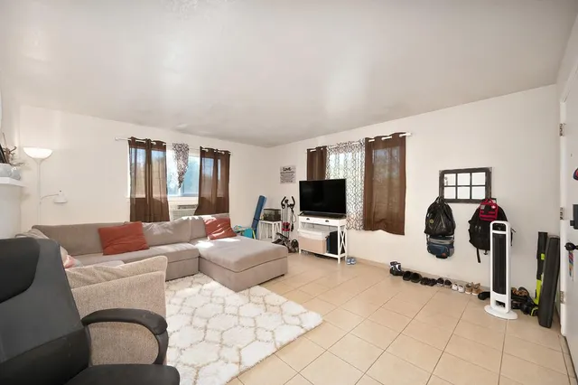 a kitchen with stainless steel appliances a sink and a stove
