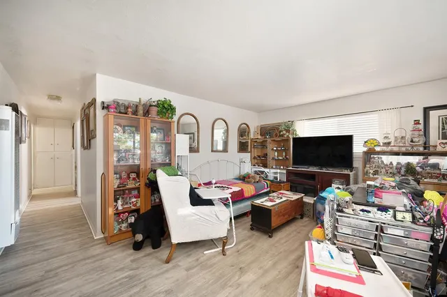 a kitchen with lots of counter top space and stainless steel appliances