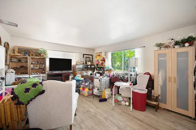 a kitchen with granite countertop a stove and a sink